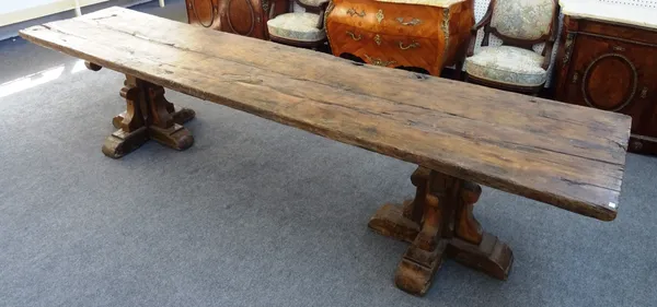 A large Medieval style refectory table, the oak double plank top on two square 'X' frame pedestals, 351cm long x 76cm wide x 77cm high.