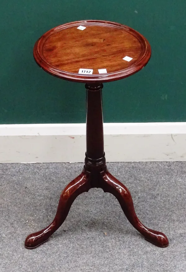 A George II mahogany kettle stand, the dished circular top on associated tripod base, the top 29cm diameter x 58cm high overall.