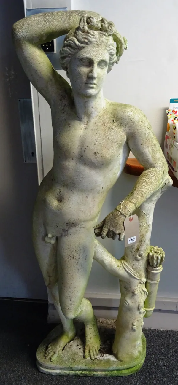 A reconstituted stone figure of Apollo in standing pose, 53cm wide x 148cm high.