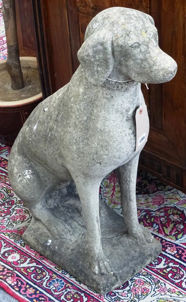 A pair of reconstituted stone figures of seated dogs, on rectangular bases, 45cm wide x 73cm high, (2).