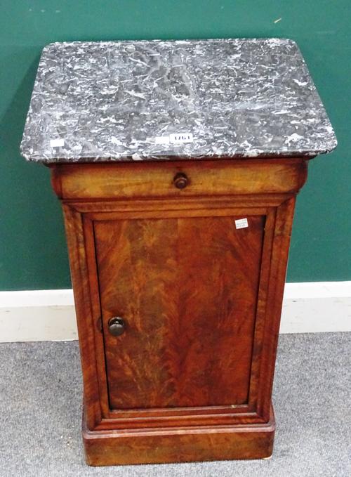 A Charles X night stand, the dished marble top over a mahogany base with cushion drawer over cupboard, on plinth base, 44cm wide x 74cm high x 37cm de