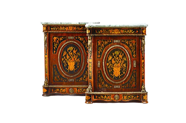 A pair of Victorian style pier cabinets, each with shaped marble top over a faux marquetry gilt metal mounted single door base, 75cm wide x 95cm high