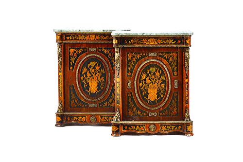 A pair of Victorian style pier cabinets, each with shaped marble top over a faux marquetry gilt metal mounted single door base, 75cm wide x 95cm high