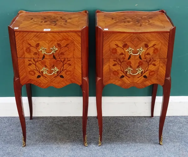 A pair of mid-18th century style French floral marquetry inlaid Kingwood two drawer bedside tables, on cabriole supports, 40cm wide x 74cm high x 32cm