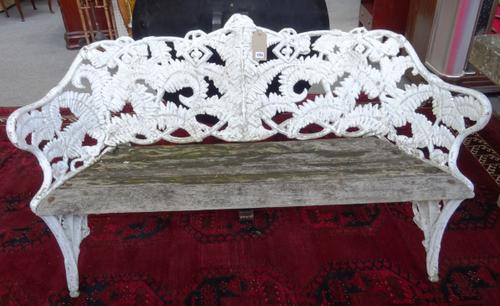 After Coalbrookdale; a white painted 19th century cast iron garden bench, in the fern and blackberry pattern, with slatted wooden seat, 160cm wide x 8