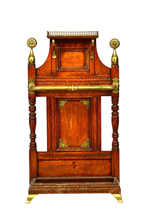Attributed to Jas Shoolbred, a Victorian brass mounted oak hall/stick stand, with retailer's plaque to verso 'George Davis, Plymouth', 55cm wide x 100