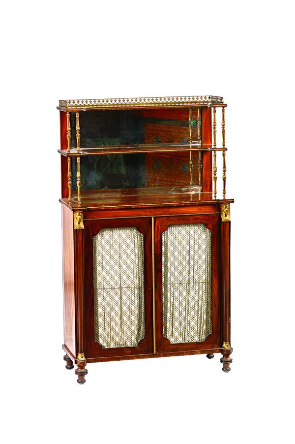 A Regency gilt metal mounted mahogany chiffonier with mirrored two tier back over pair of grille doors, flanked by Egyptian caryatid mounts, 79cm wide
