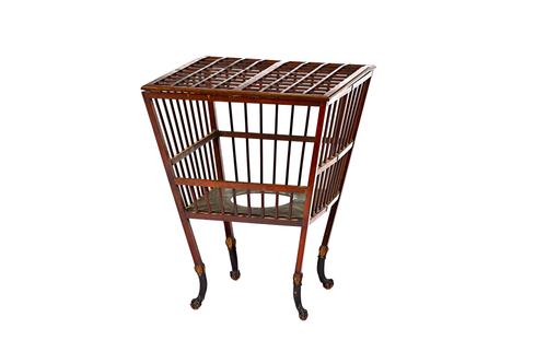 A Regency mahogany brass mounted stirrup cup stand, with lattice collapsible top over spindle turned concertina action sides, on parcel gilt scale car