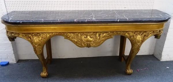 A massive 18th century style console table, the 'D' shaped marble top over an acanthus carved gilt base with pair of scroll supports, 241cm wide x 61c