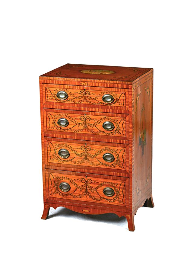 A Sheraton Revival satinwood chest of four long graduated drawers, polychrome painted with cherubs and ribbon tied floral sprays, on splayed bracket f