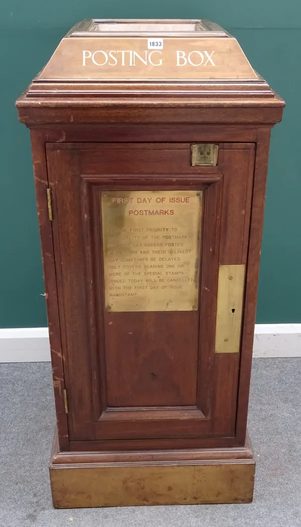 An internal mahogany posting box, with brass mounted top collar, over a square panelled base, with single door, 56cm wide x 130cm high.
