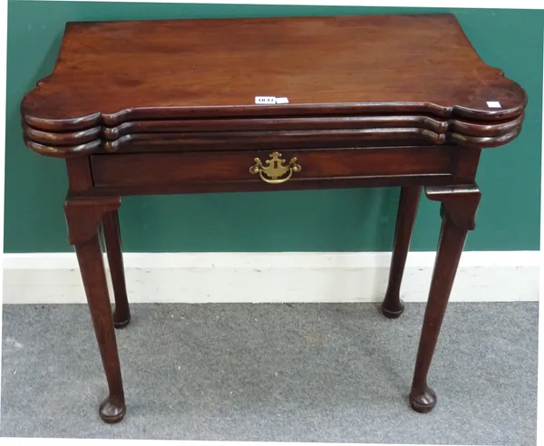 A George II triple action foldover tea/card table, with single frieze drawers on club supports, 80cm wide x 76cm high x 38cm deep.