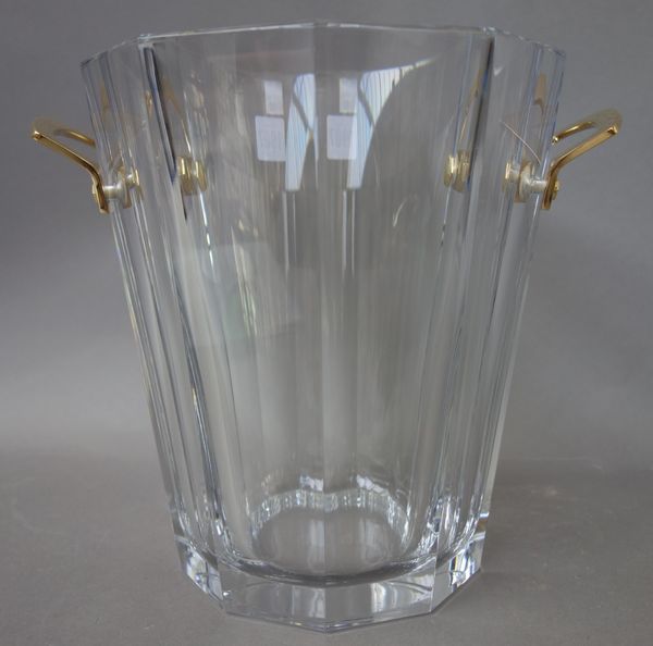 A Baccarat glass champagne bucket or wine cooler, late 20th century, of ten sided tapering form with twin gilt metal handles, acid etched mark to base