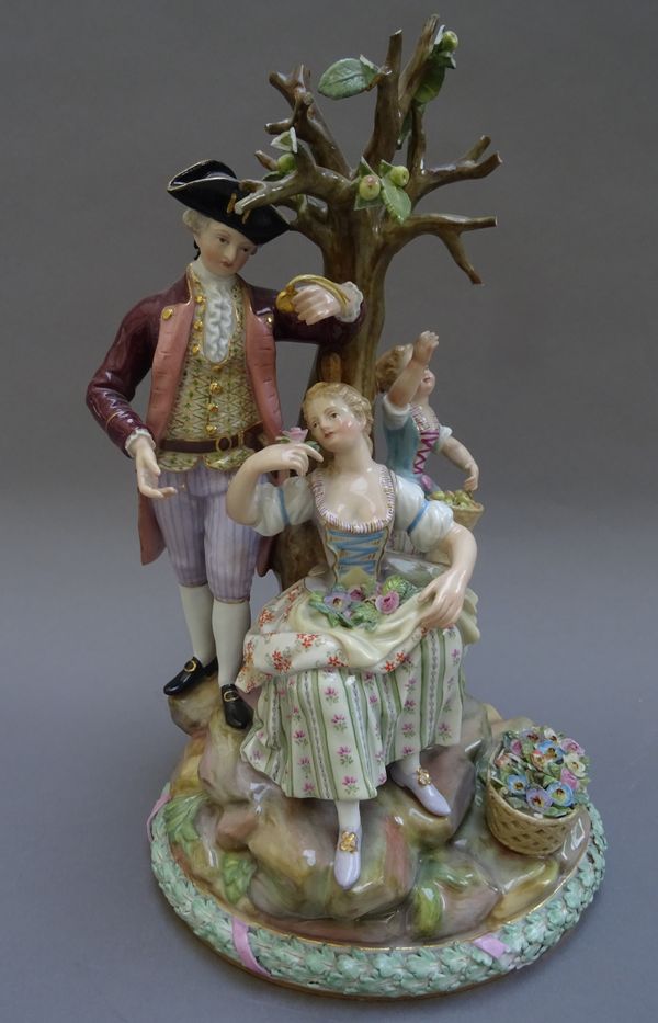 A Meissen porcelain figure group of 'The Apple Pickers', late 19th century, after an original model by M.V. Acier circa 1772, incised D94, stamped 72,