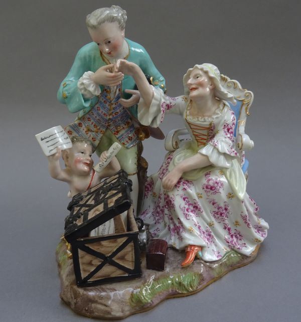 A Meissen porcelain figure group, 'The Old Women in Love', late 19th century, after a model by J.J Kaendler, incised T76, stamped 40, blue crossed swo