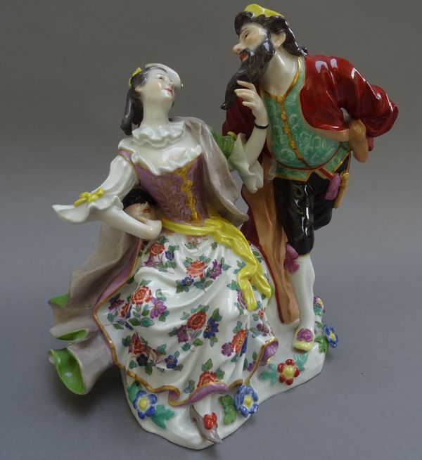 A Meissen porcelain figure group of Pantalone and Columbine, circa 1910, after the original model by J.J. Kaendler, numerous stamped and painted marks