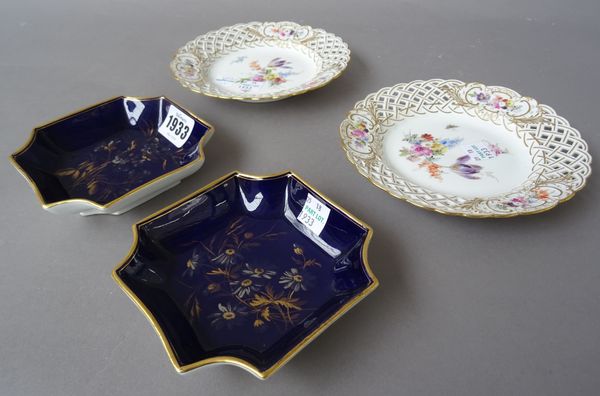 A pair of Meissen porcelain dishes, 20th century, each decorated with gilt flowers against a square shaped cobalt blue ground (10.5cm wide) and two Me