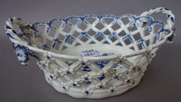 A Worcester blue and white two-handled oval pierced basket, circa 1775, transfer printed with `The Pine Cone Group', blue crescent mark, (a.f),  26.5c