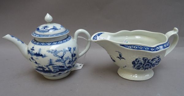 A small Worcester blue and white bullet-shaped teapot and cover, circa 1760, painted with `The Cannonball' pattern, (a.f), blue workman's mark, 11cm.