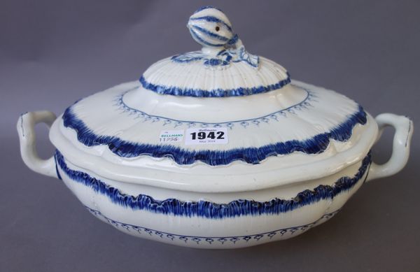 A Wedgwood pearlware two handled tureen and cover, late 18th century, with foliate moulded finial to the oval lid, decorated with blue foliate bands,