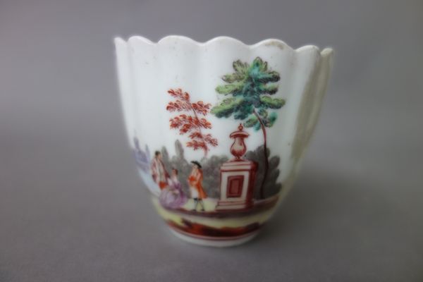 A Chelsea lobed coffee cup, raised anchor period, circa 1752, painted in Meissen style with figures in a landscape, the reverse painted with flower sp