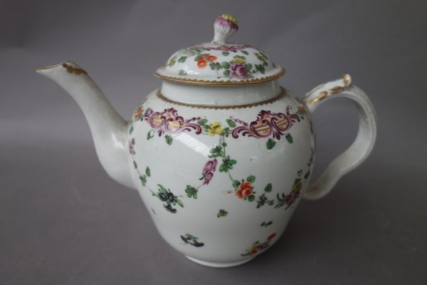 A Champion's Bristol porcelain teapot and cover, circa 1775, painted with flower sprigs and garlands suspended from a floral and leafy scroll border,