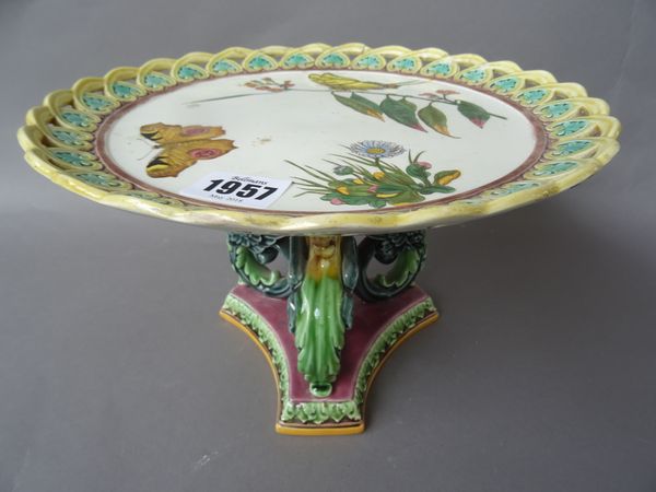 A Wedgwood earthenware part dessert service, 1870's, printed and coloured with birds, flowers and insects inside pierced majolica glazed borders, comp