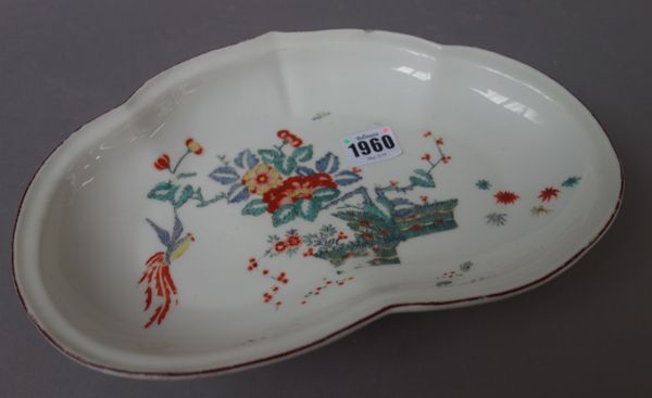 A Chelsea heart- shaped dish, red anchor period, circa 1753-55, painted in the Kakiemon palette with a long-tailed bird in flight besides a flowering