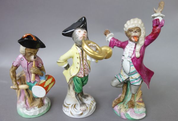 Twenty one porcelain monkey band figures, 20th century, part sets and singles (a.f), the tallest 17cm high, (21).