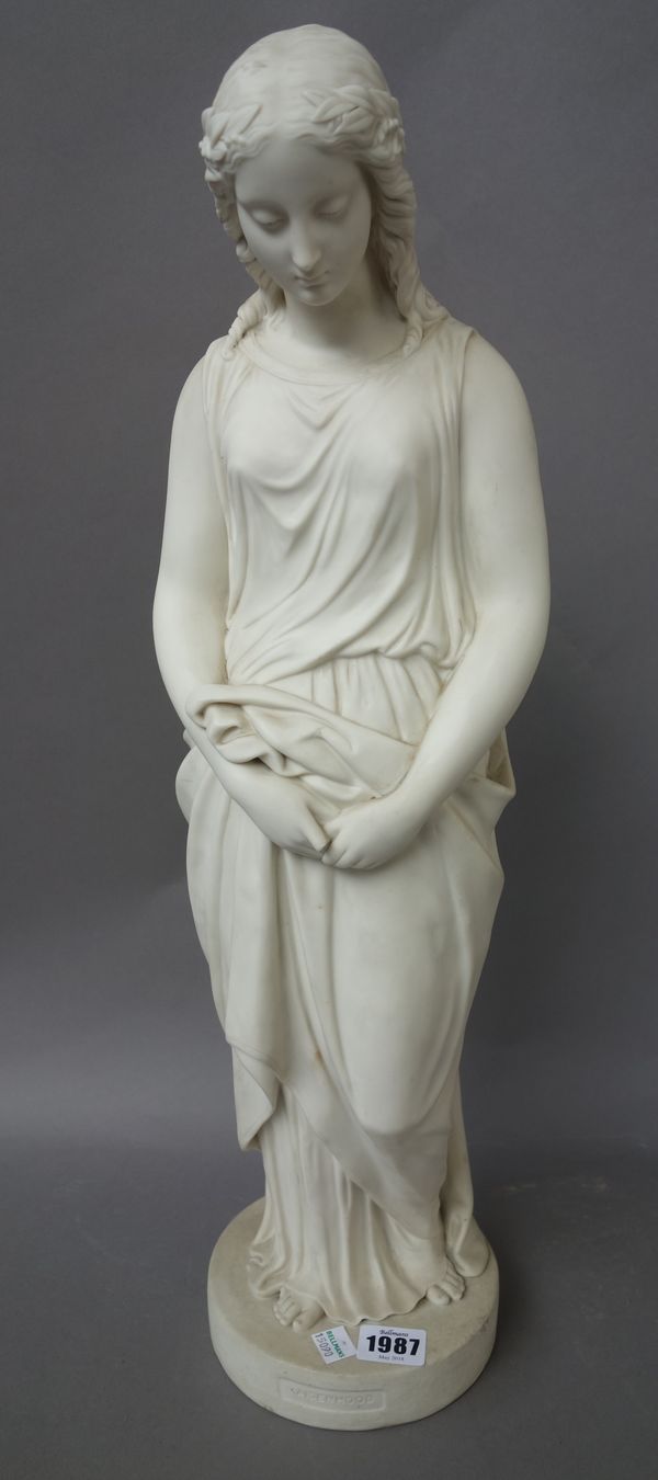 A Copeland parian figure of `Maidenhood', circa 1861, modelled by E.G.Papworth Jnr., as a young woman standing in long robes with hands clasped, impre