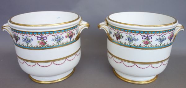 A pair of Sèvres porcelain bottle coolers (seau a demi-bouteille ordinaire), circa 1775, each painted with a border of vases of flowers, flowers suspe