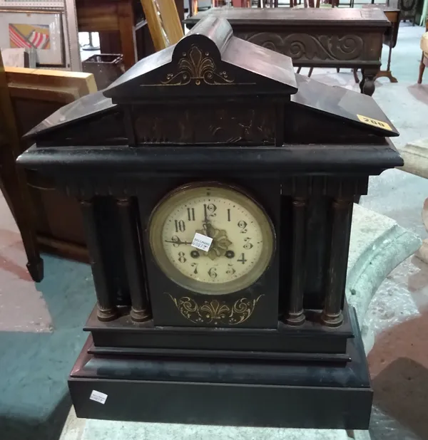 A 19th century black slate cased mantle clock, 36cm wide x 46cm high.   C9