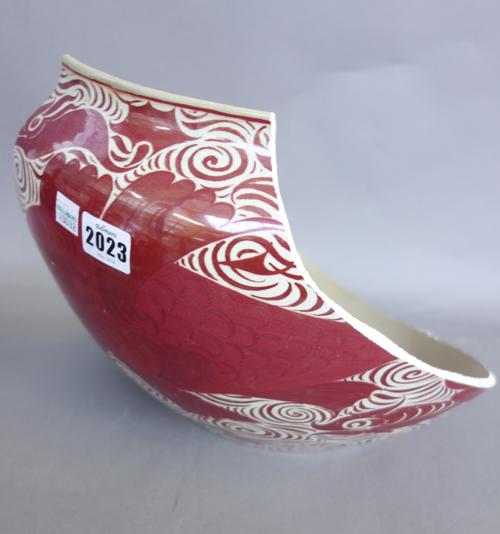 A William de Morgan  red lustre ware bowl decorated with stylized fish, blue painted mark to base 'W DE MORGAN & CO Fulham 2168 J.J', (broken in five