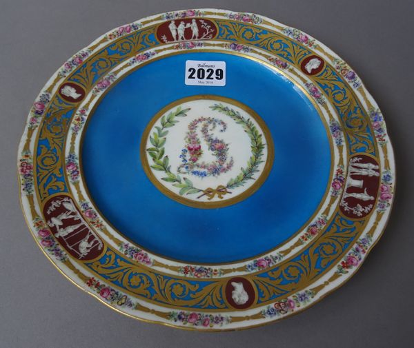 A Sèvres blue celeste-ground porcelain plate of Catherine the Great service type, painted in the centre with a floral monogram, the border gilt with f