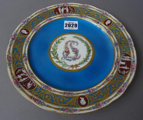 A Sèvres blue celeste-ground porcelain plate of Catherine the Great service type, painted in the centre with a floral monogram, the border gilt with f