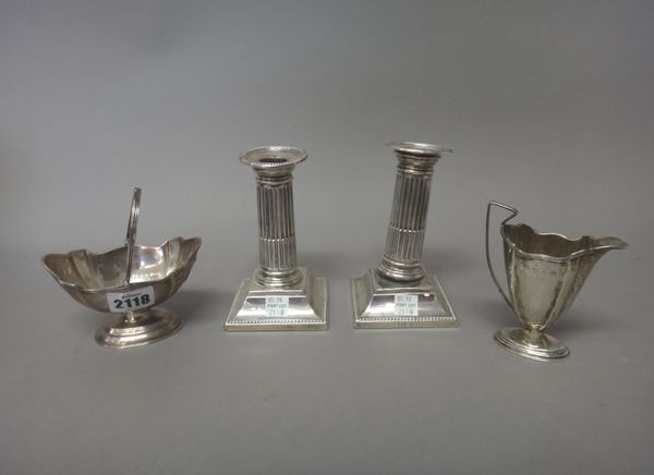 Silver and silver mounted wares, comprising; a pair of Victorian candlesticks, each formed as a classical fluted column, raised on a square base, deco