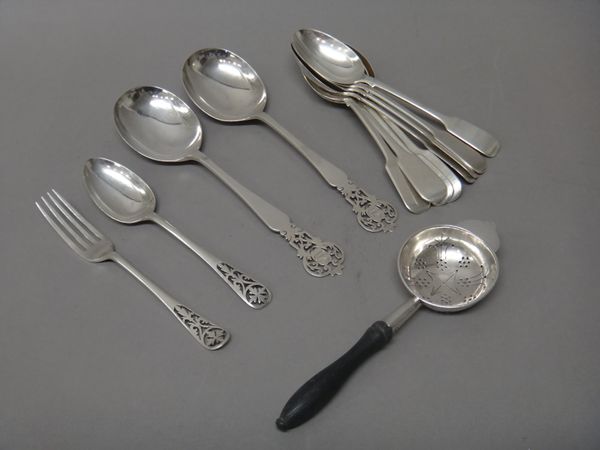 Silver, comprising; eight Victorian fiddle pattern dessert spoons, London 1860, two serving spoons, a dessert spoon and a dessert fork, each with pier