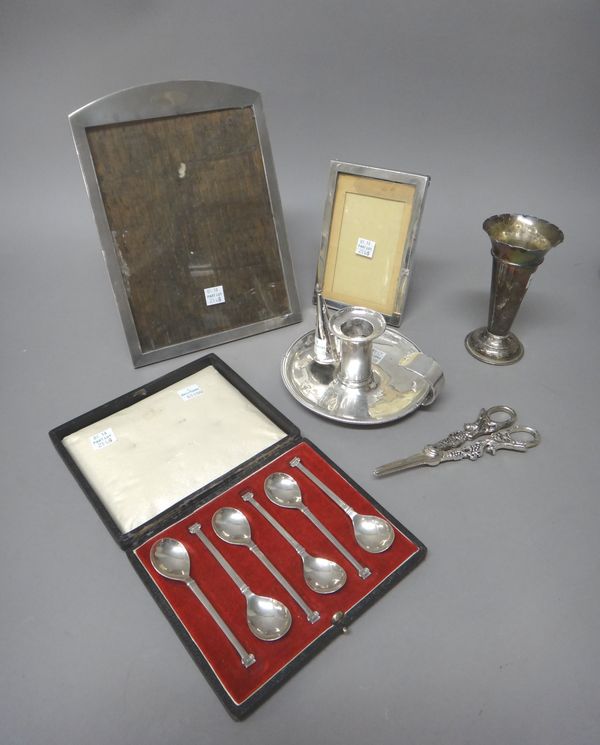 Mostly silver and silver mounted wares, comprising; a rectangular photograph frame, with engine turned decoration, Birmingham 1928, a rectangular plai