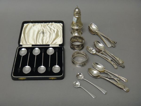 Silver, comprising; a set of six coffee spoons, with engraved decoration, Sheffield 1908, five teaspoons, London 1903, eleven further spoons, two napk