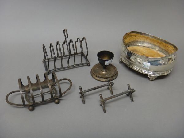 Silver and plated wares, comprising; a George III silver mounted oval cruet stand, raised on four feet and fitted with a wooden base, London 1808, two