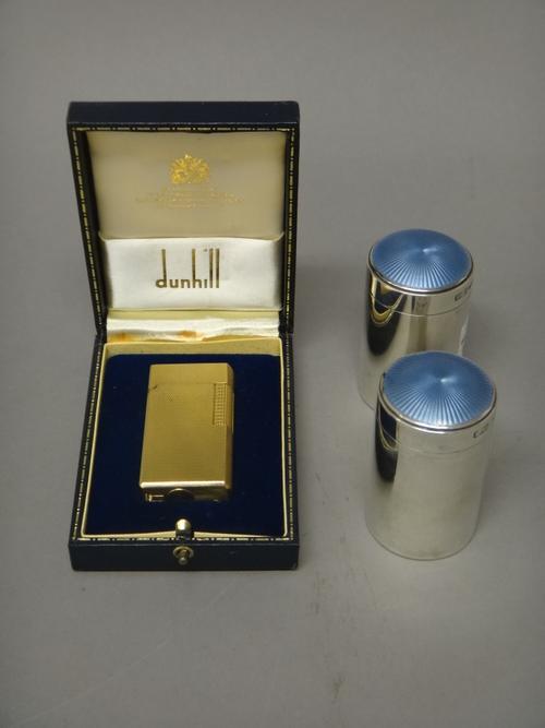 A pair of silver and pale blue enamelled toilet jars, each of cylindrical form, with pale blue enamelled decoration to the detachable cover, height 6c