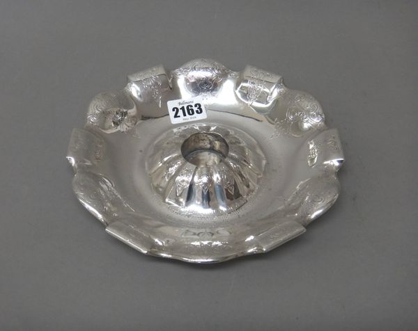 A Victorian silver shaped circular inkstand, of dished form, with engraved decoration and presentation inscribed, London 1853, diameter 20.5cm, weight