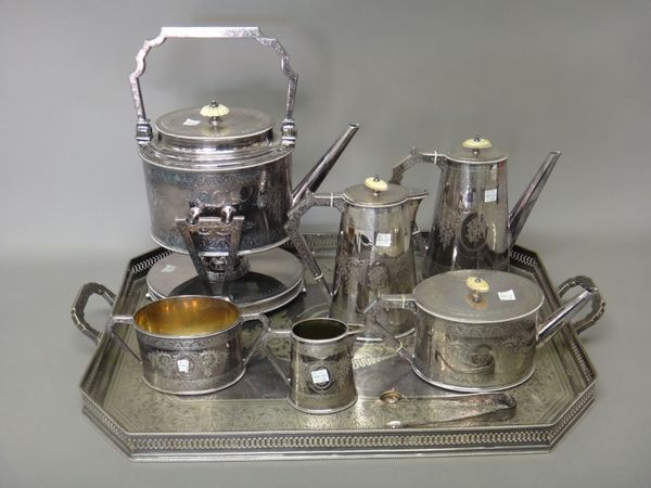 A Victorian Elkington & Co plated seven piece tea set, comprising; a spirit kettle, on a stand with a spirit burner, a teapot, a coffee pot, a hot wat