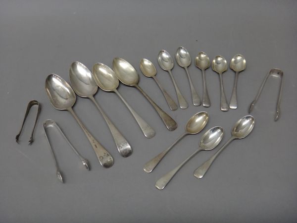 Silver table flatware, comprising; two old English pattern table spoons, two dessert spoons, three pairs of sugar tongs, five matching old English pat