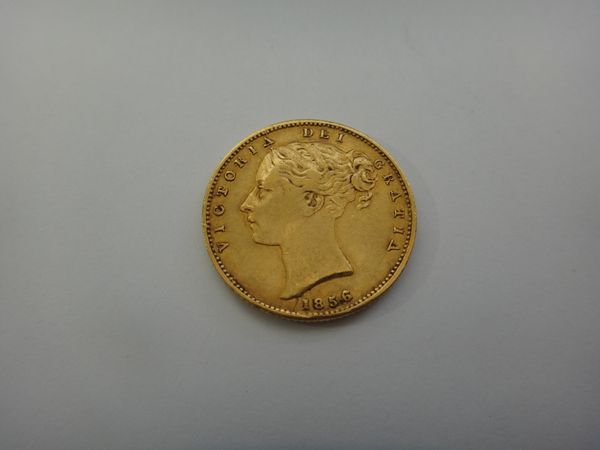 A Victoria young head shield back sovereign 1856.