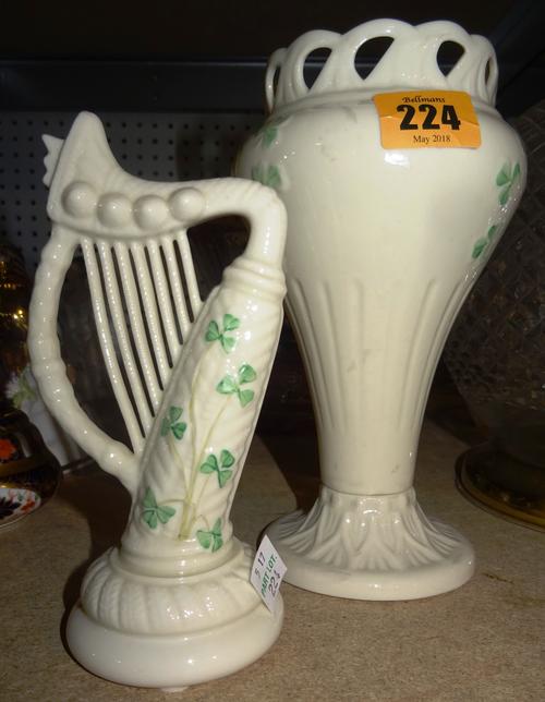 Glassware including; a cranberry cut glass footed bowl, a clear cut glass table lamp formed as a sphere, a Belleek vase and a harp,  (4)   S4T