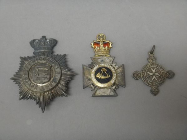 A Victorian silver plated hat badge, detailed South West Middlesex Rifles, an enamelled medal, with a bugle motif to the centre and with an enamelled