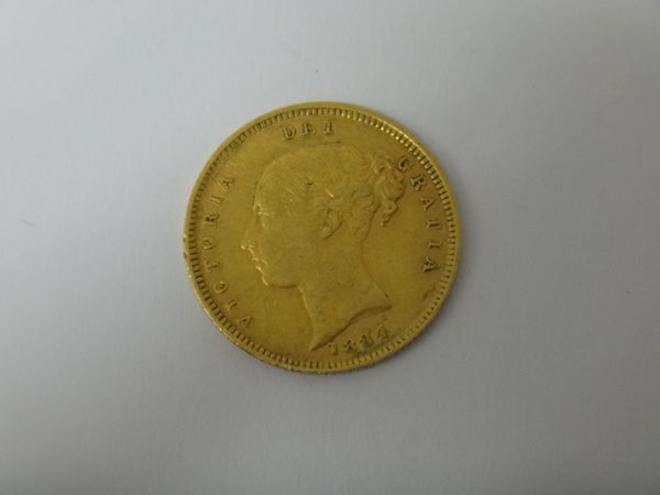 A Victoria young head shield back half sovereign 1884.