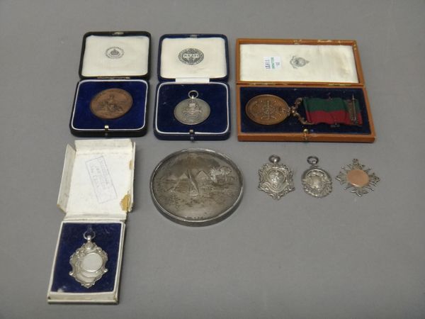 One silver and one bronze Notts & Derby Regiment medal, four silver fob medals, a Royal Tournament bronze medallion, with a case and an Egyptian Comma