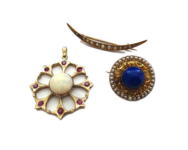 An opal and ruby pendant, in a pierced circular design, mounted with the circular opal at the centre, in a surround of eight cushion shaped rubies and